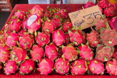 Dragon fruits at the market stall in Chiang Mai, Thailand.の写真素材