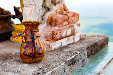 Small vase for incense on the altar in the Tiger Cave Temple.の写真素材