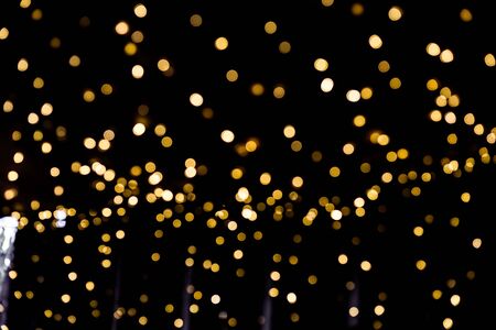 Defocused Christmas Bokeh fairy lights background. Christmas backdrop.