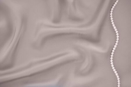 Smooth elegant light gray silk textured background. Copy space.の写真素材