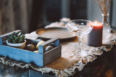 Table setting for home dining. Celebrating Easter alone. Self-isolation. Cozy kitchen.の写真素材