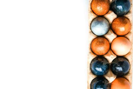 Dark blue Easter eggs on gray backgroundの写真素材