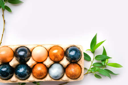 Dark blue Easter eggs on gray background