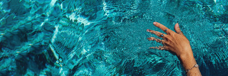 Swimming in a pool. Summer holidays concept.
