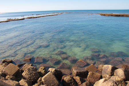 landscape of the sea and the horizon with stonesの写真素材