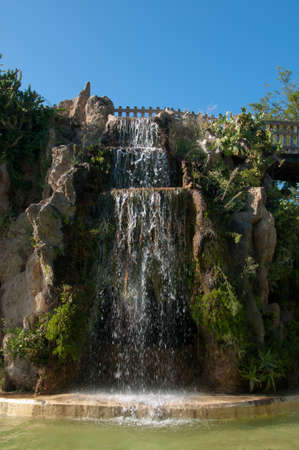Waterfall and grotto in the Genoves park of Cadizの写真素材