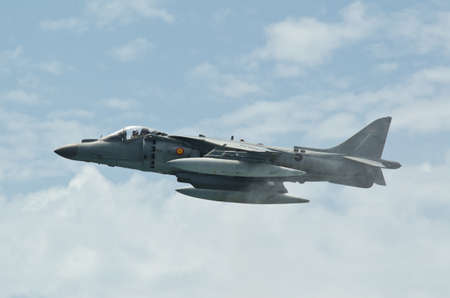 Malaga (Spain) - 28 May: Celebration of Armed Forces Day at the beach of La Malagueta. Aircraft AV-8B Plus Harrier II making a stationary flight on the airshow on 28 May 2011 in Malaga, Spainのeditorial素材