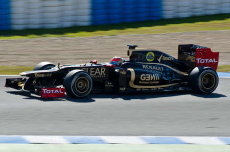 JEREZ DE LA FRONTERA, SPAIN - 2012 FEB 09: Romain Grosjean of Lotus Renault team drives his F1 car during training session at Jerez circuit on February 09, 2012, in Jerez de la Frontera , Spainのeditorial素材