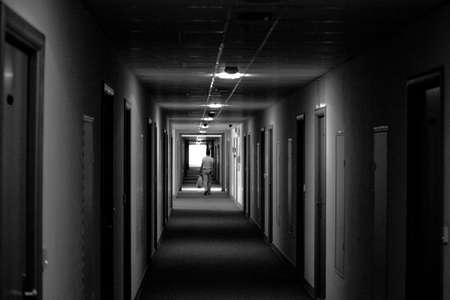 the darkness of the hallway and the man to do His interested meの写真素材