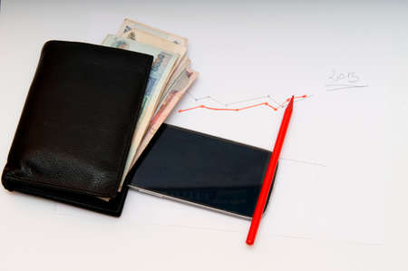 the photo Represents the value of communication using cellphone, time is moneyの写真素材