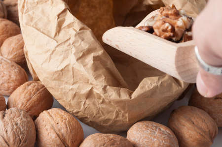 walnuts in the foreground for dietの写真素材