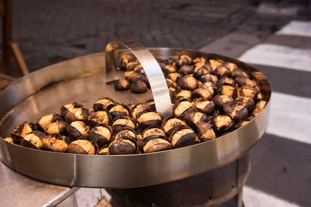 roasted chestnuts for sale on the street.の写真素材