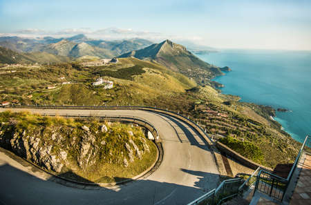 road leading to the beautiful sea of Maratea in Basilicataの写真素材
