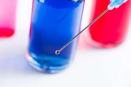 medical ampoules and syringe isolated on white background.の写真素材