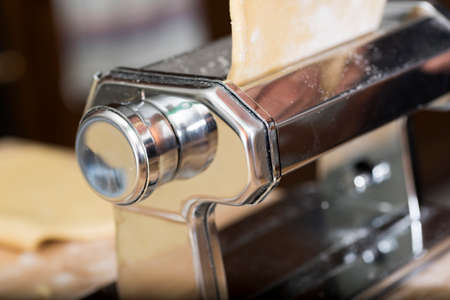 Metal machine to make the dough and fresh pasta for lasagna.の写真素材