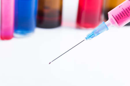 medical ampoules and syringe isolated on white background.の写真素材