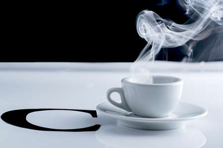 small cup of steaming coffee. Italian espressoの写真素材