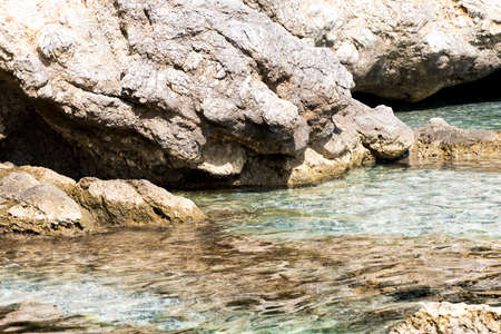 Rough sea blue color and the background a reefの写真素材