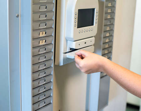 clock in the badge to get to workの写真素材