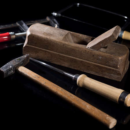 old carpenter's tools for working with woodの写真素材