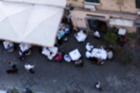 People blurry and shoot from outside the restaurant