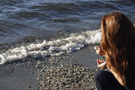 Beach wistful girl の写真素材
