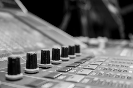 Professional Audio Mixing Board/ Console and a row of digital audio encodersの写真素材