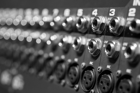 Rear view of Professional Audio Mixing console inputs an outputsの写真素材