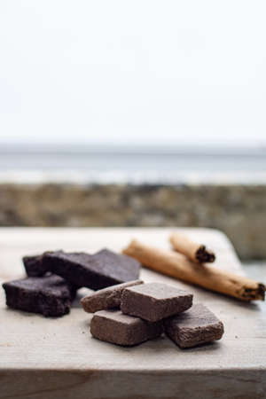 Traditional Mexican chocolate bar and spicesの写真素材