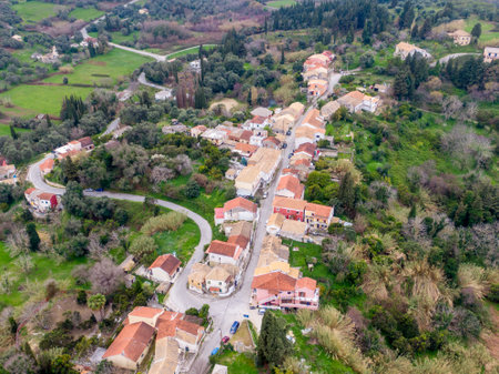 Aerial view of a quaint village nestled in a lush green landscape.の写真素材