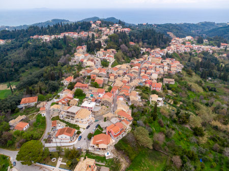 Aerial view of a picturesque village nestled in a green valley