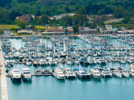 Panoramic view of a densely packed harbor, filled with an array of boats and yachts in calm waters.の写真素材