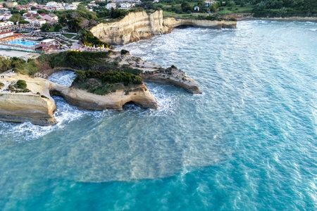 Aerial view of stunning sandstone cliffs and turquoise sea, a breathtaking coastline vista and...