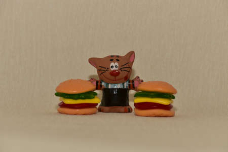 The cat chooses foodの写真素材