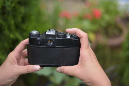 I hold the camera in my handsの写真素材