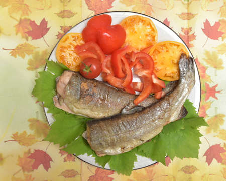 Fried fish with vegetablesの写真素材