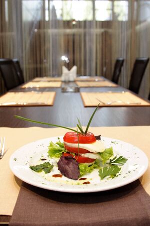 Photo of a traditional italian caprese on plateの写真素材