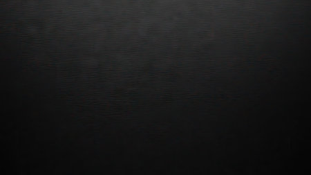 This image features a solid black background with a subtle, textured pattern. The composition emphasizes depth through variations in shading. Suitable for various design applications, the image can be used in web design, graphic design projects, and for creating visual elements in digital media presentations.の素材