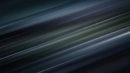This abstract image features diagonal lines with a blurred effect. The composition is characterized by shades of blue and gray, creating a sense of movement and depth. The design employs a smooth, textured appearance, potentially suitable for digital design or artistic expression. It could be used for various commercial projects.の素材