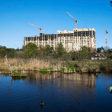 high-rise buildings, located on the edge of the wetlandsの写真素材