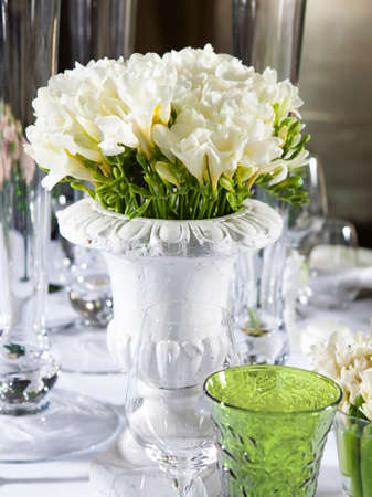 decoration of wedding table. bouquet of white flowers of anemoneの写真素材