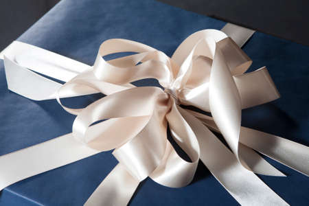 Blue Square Gift Box with Grey Ribbon and Bowの写真素材