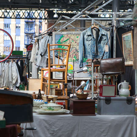 LONDON, UK - APRIL 22, 2016: People shop at Old Spitalfields Market in London. A market existed here for at least 350 years.のeditorial素材