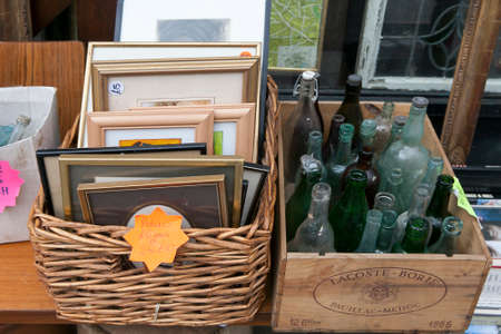 London, UK - July 1, 2012: Antiques at a stall in Brick Lane, Whitechapel. On Sunday Brick Lane is...