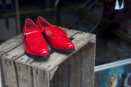 Retro photo of red shoesの写真素材