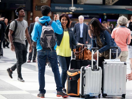 LONDON, UK - SEPTEMBER 12, 2015: Liverpool street train station with lots of people, waiting for...