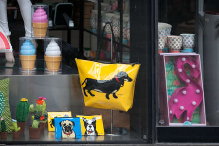 London, UK - July 17, 2016. storefront with funny colored bags with leatheretteのeditorial素材