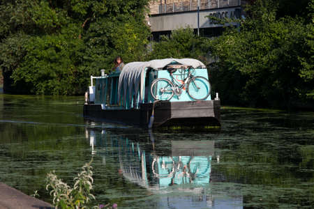 London, UK - July 17, 2016. Boats on the Regents Canal