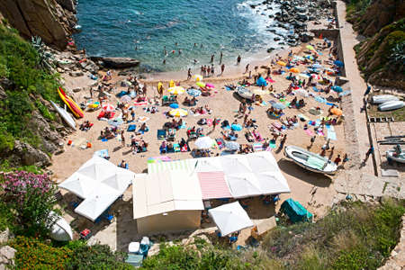 SPAIN - JULY 12, 2015: Tossa Beach is famous destination in Spain. Located in Tossa de Mar, Catalonia on the shore of Balearic Sea in Costa Brava region, place is distanced 105 km north of Barcelonaのeditorial素材