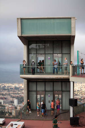 BARCELONA - July 24: People in the viewing platform over Barcelona at Tibidabo  on JULY 24, 2016 in Barcelona, Spain.のeditorial素材